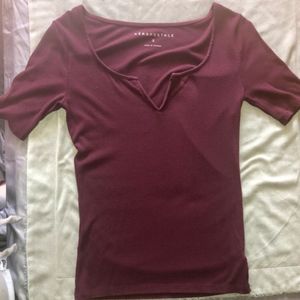 Purple tight fitted shirt